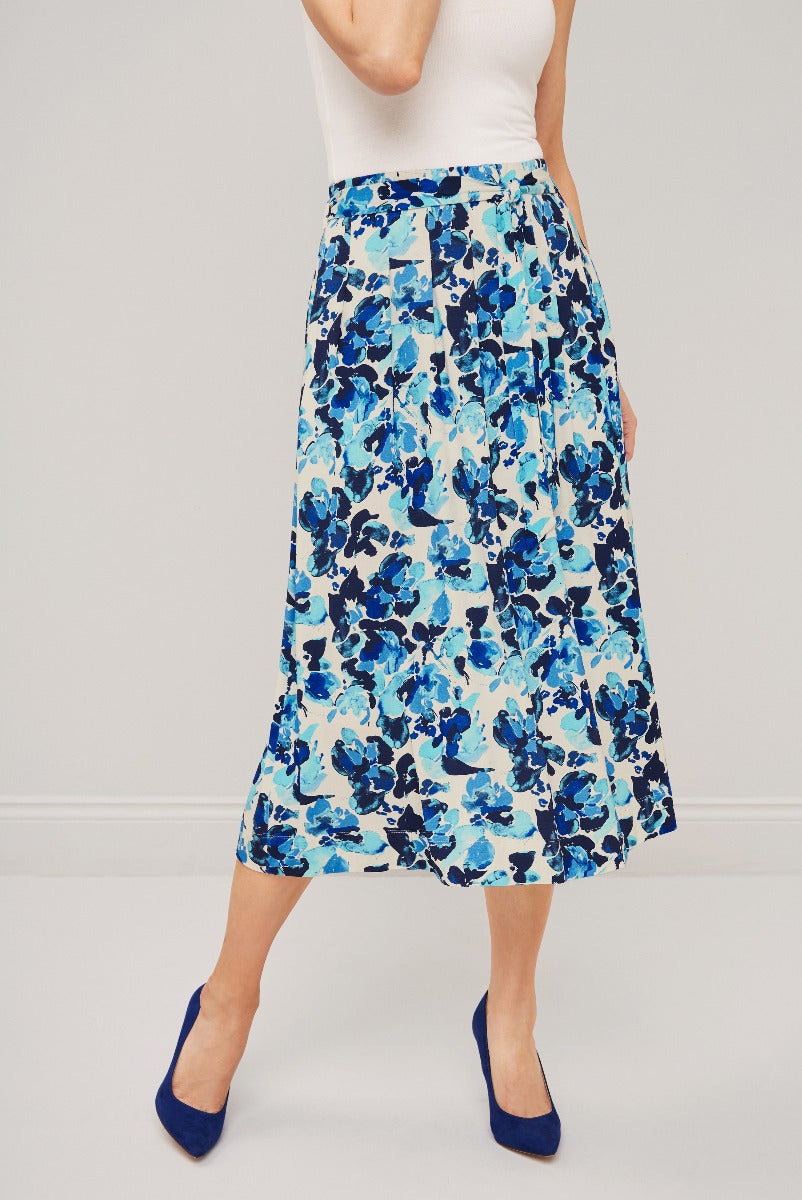 Lily Ella Collection A-line Floral Skirt in Blue and White, Stylish Women's Mid-Length Skirt with Blue Floral Print, Paired with White Top and Blue Heels