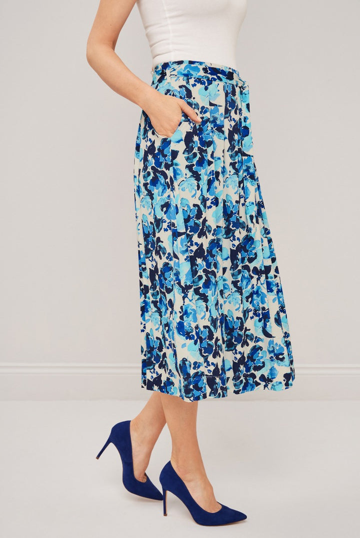 Lily Ella Collection blue floral midi skirt paired with navy high heels fashion outfit