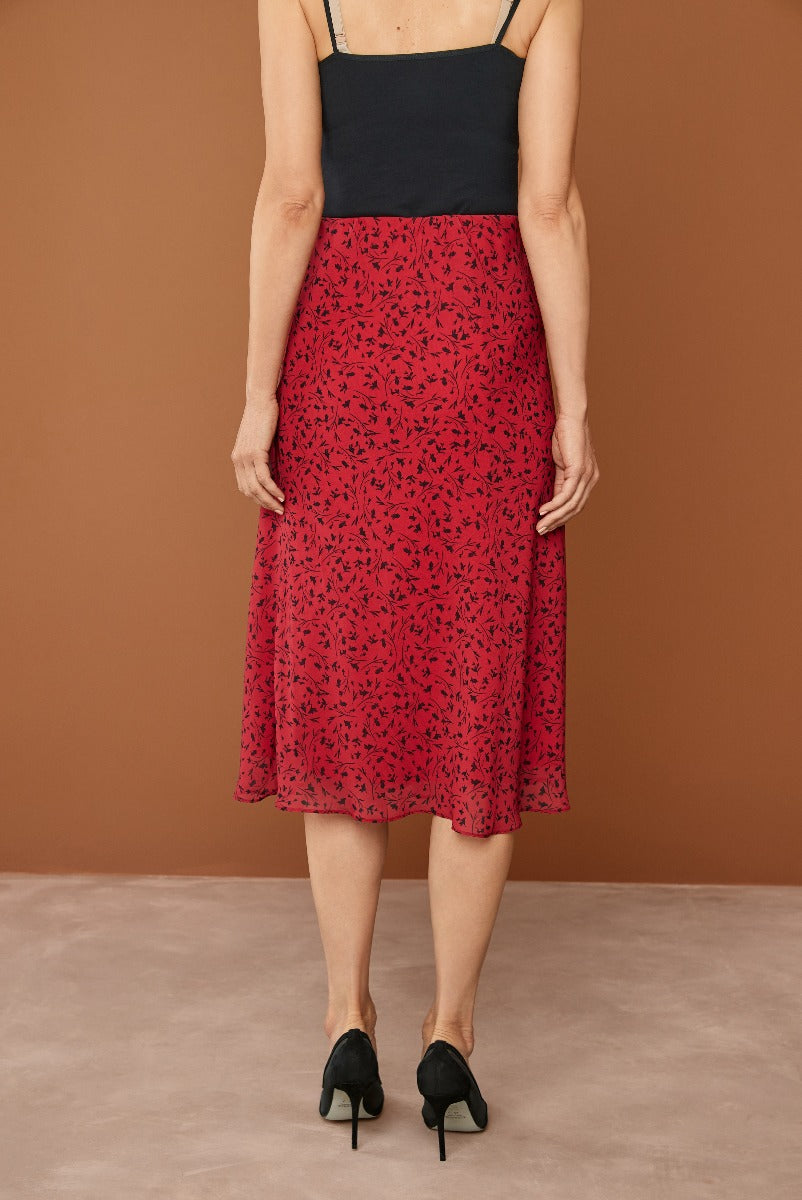 Lily Ella Collection elegant red floral midi skirt paired with chic black camisole top and classic black heels for a stylish women's outfit idea.