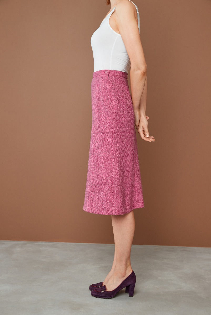 Lily Ella Collection elegant pink textured A-line skirt paired with white fitted tank top and purple heeled shoes, showcasing sophisticated women's fashion and style