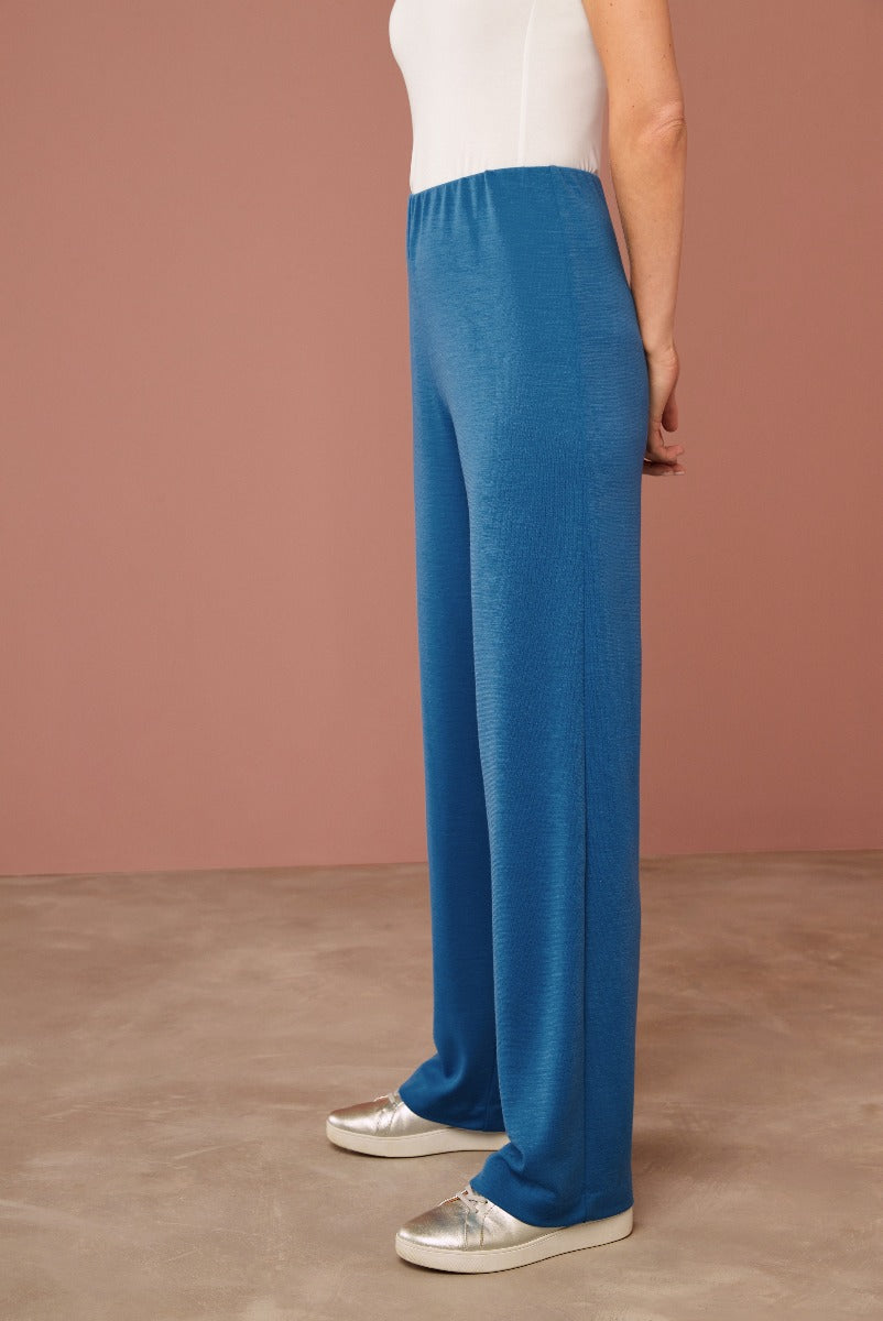Lily Ella Collection vibrant blue wide-leg trousers for women, elegant casual style, comfortable fit, paired with silver shoes.