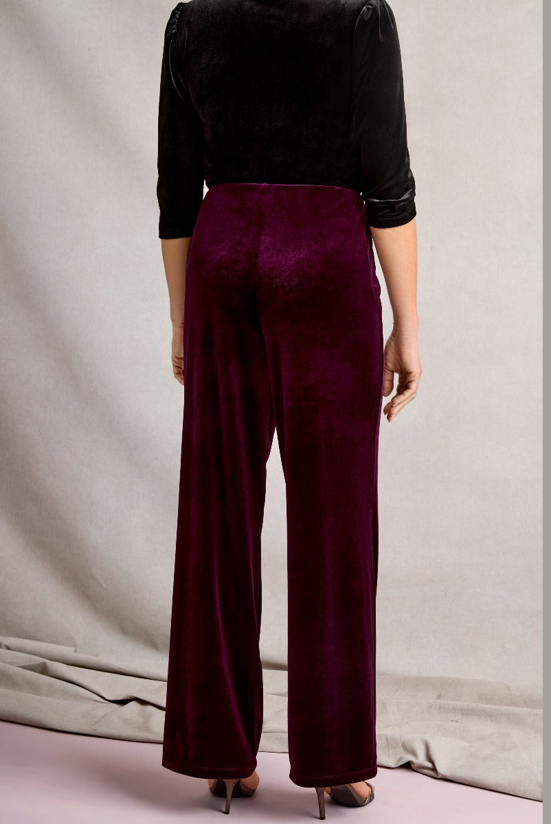 Lily Ella Collection elegant burgundy wide-leg velvet trousers for women, stylish autumn-winter fashion, comfortable high-waisted design, trendy outfit idea.